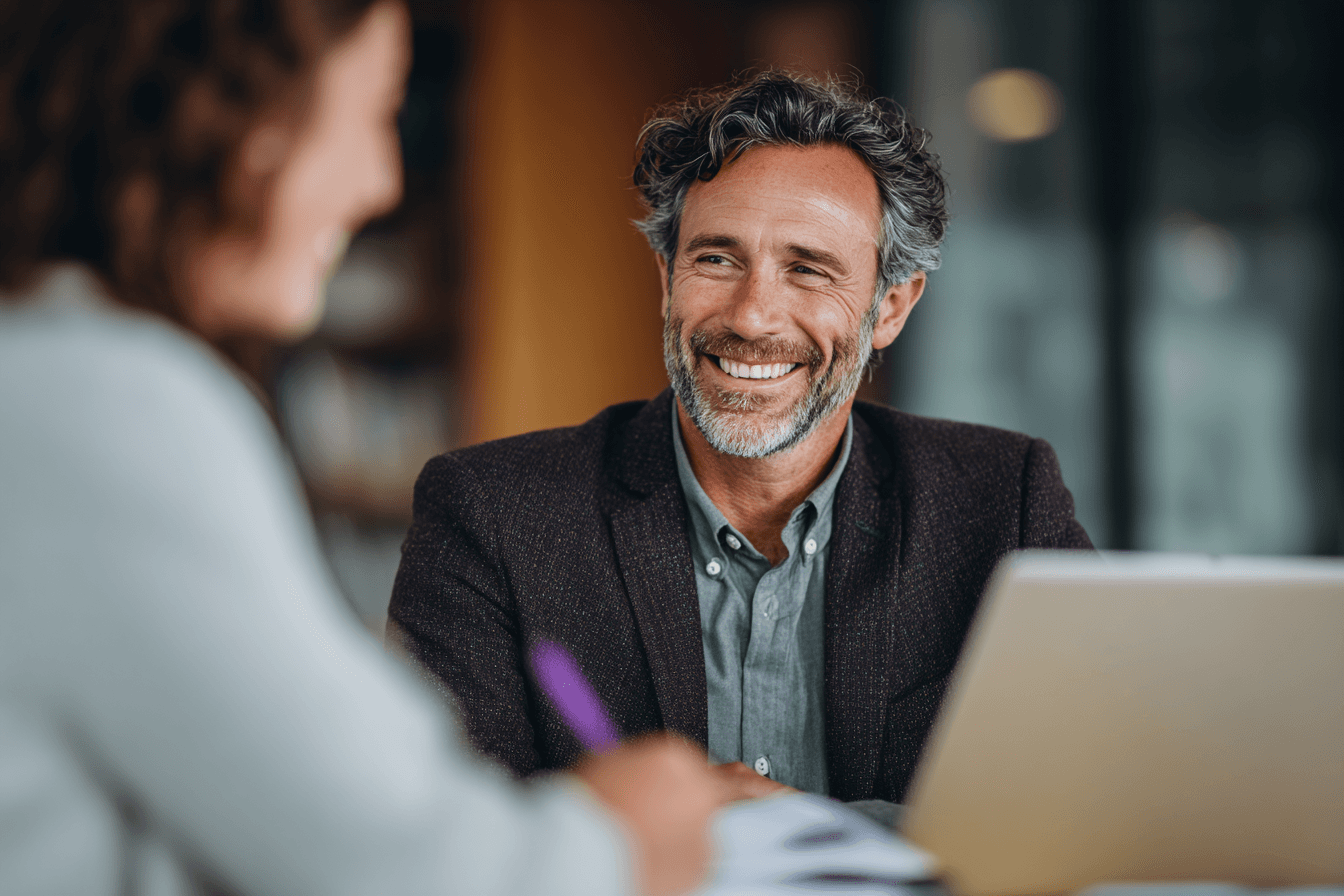 Lawyer consulting with client about pricing and services